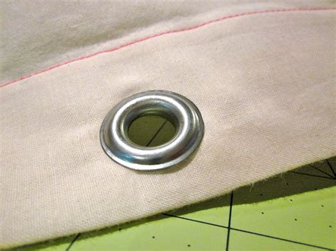 metal rings to enforce holes in fabric|fixing holes on fabric.